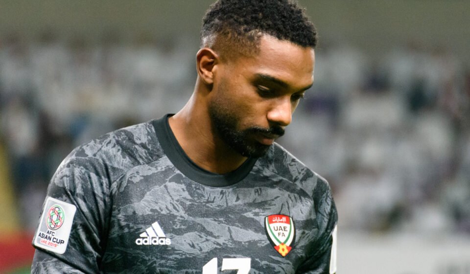 UAE goalkeeper Khalid Eisa looks down dejected during a match